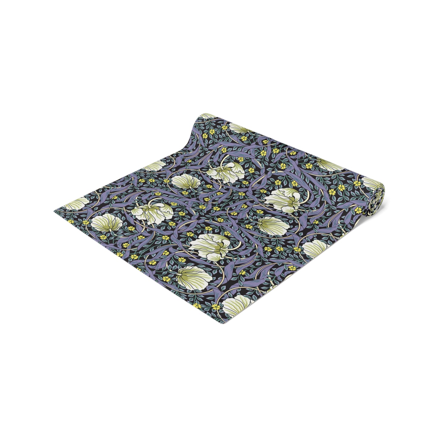 A table runner with a floral William Morris & Co pattern in shades of purple and green laid out on a dining table.