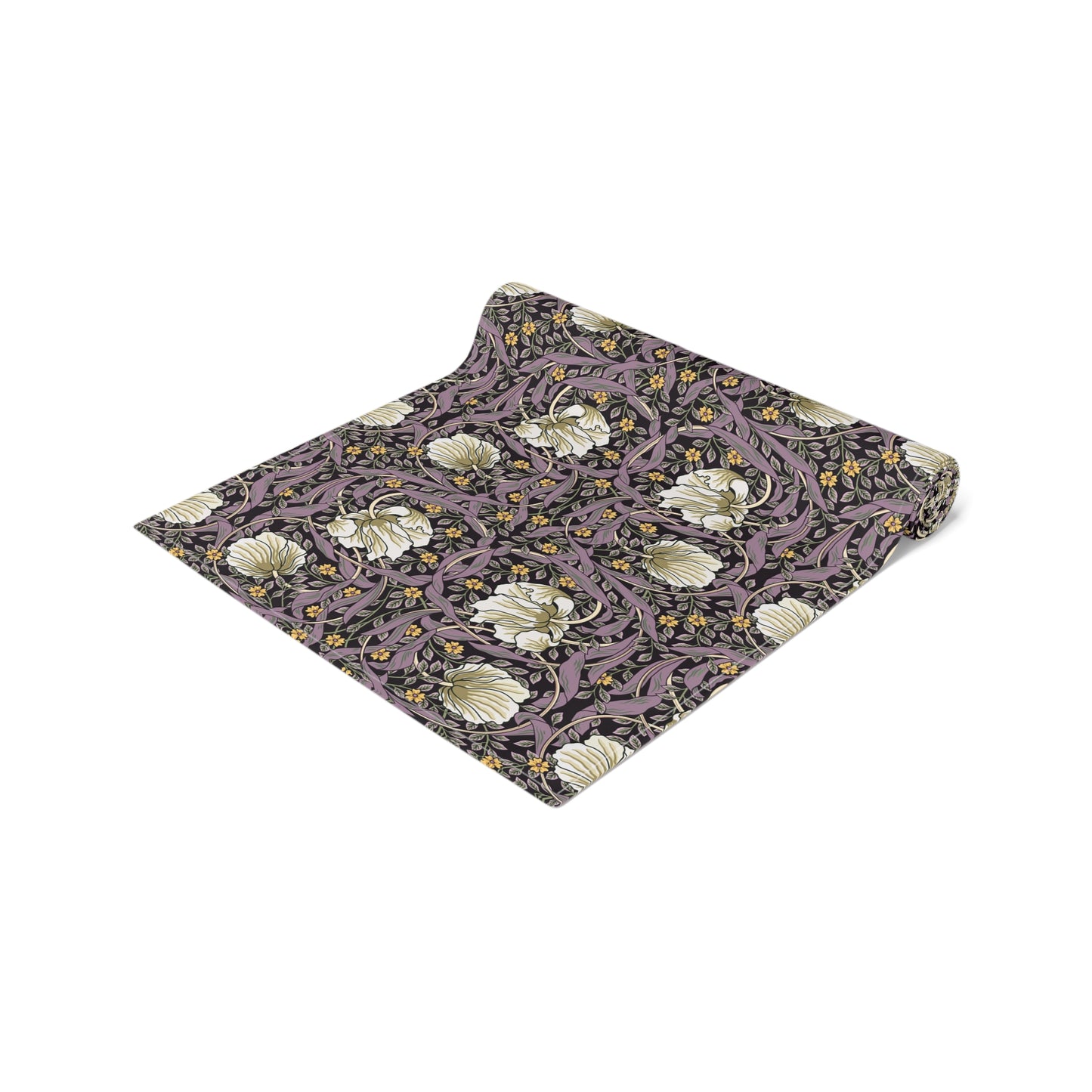 A table runner with a floral William Morris & Co pattern in purple, gold, and green colours, laid out on a dining table.