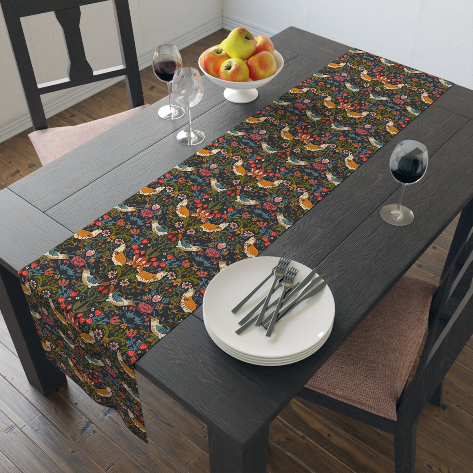 Dining table with fox and floral patterned table runner.