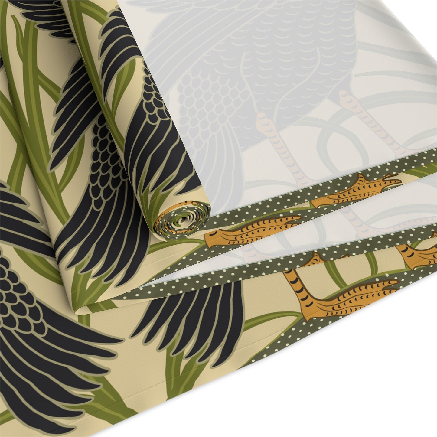 Table setting with a decorative table runner inspired by William Morris & Co featuring black swans on a tan coloured background.