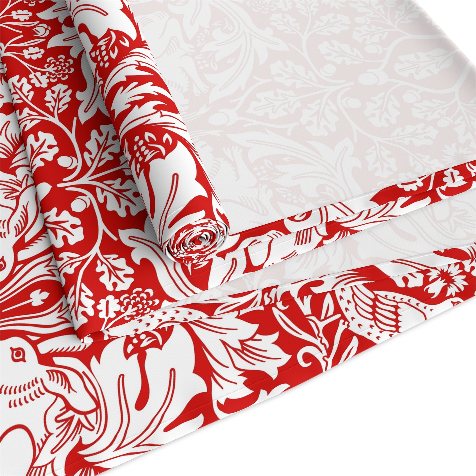 Red and white floral patterned fabric on a white background
