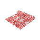 Red and white floral patterned fabric on a white background