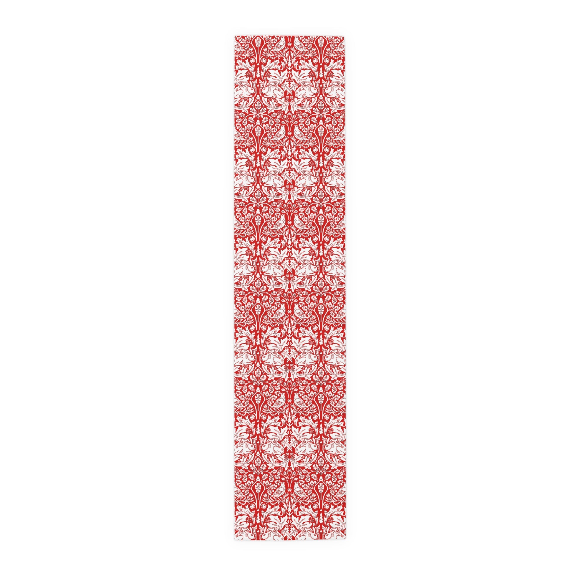 Red and white patterned table runner on a white background
