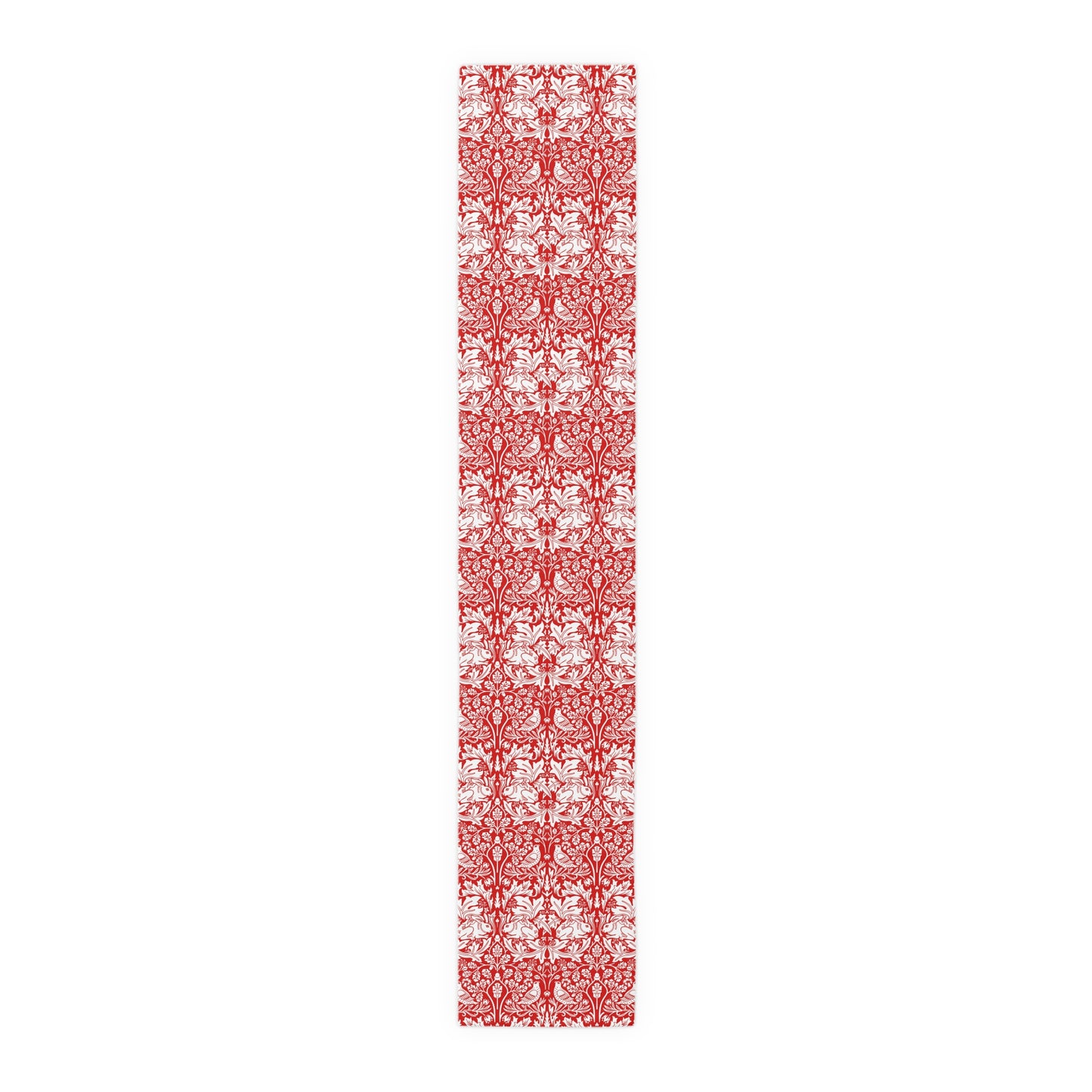 Red and white patterned table runner on a white background