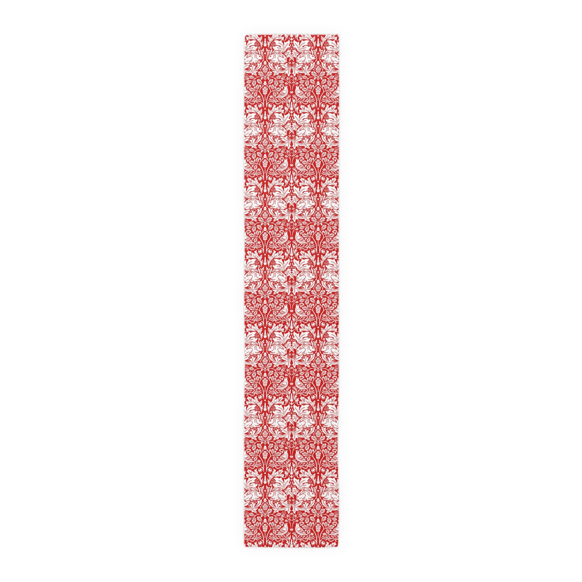 Red and white patterned table runner on a white background