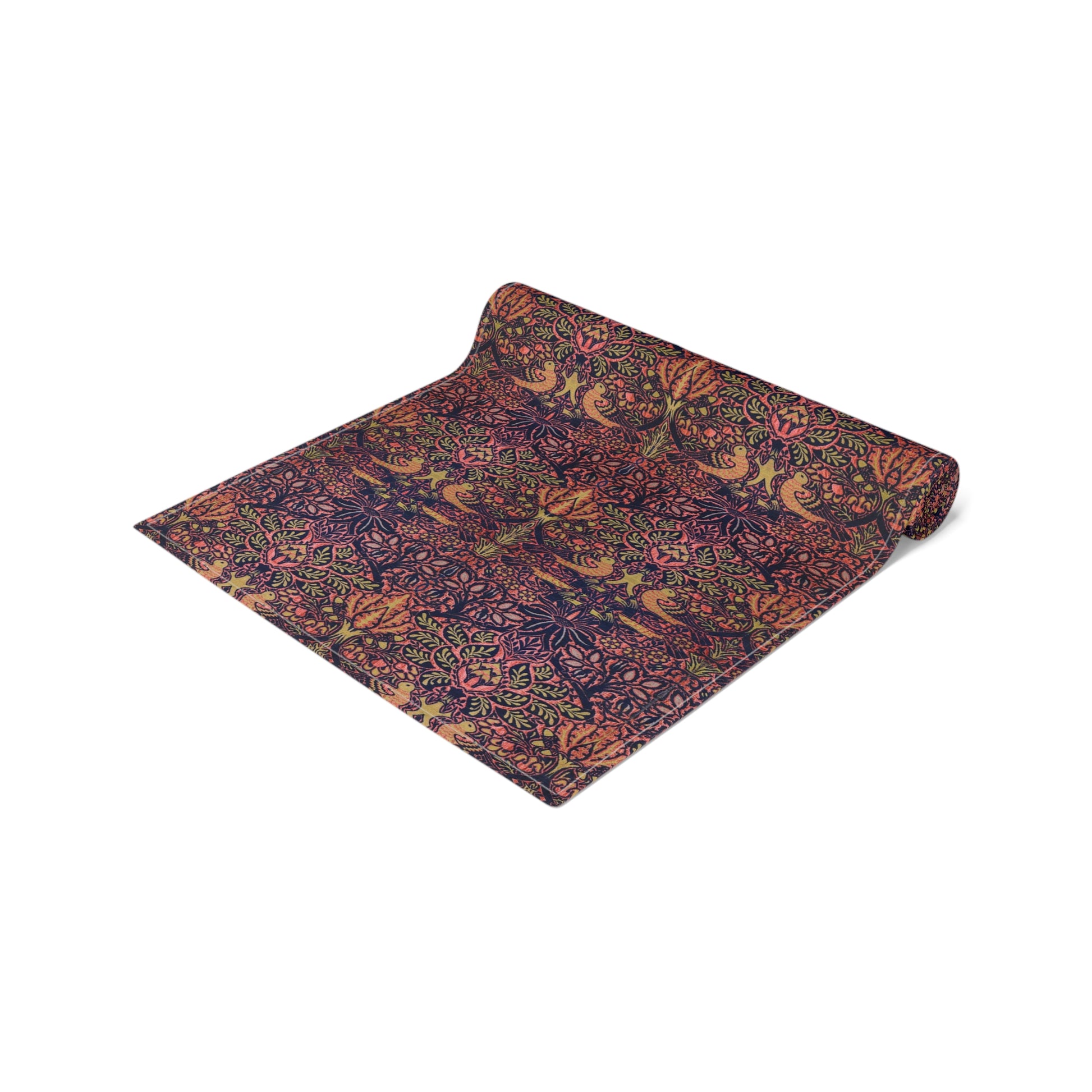 A multicolored table runner with a floral and William Morris & Co animal pattern displayed on a dining table.