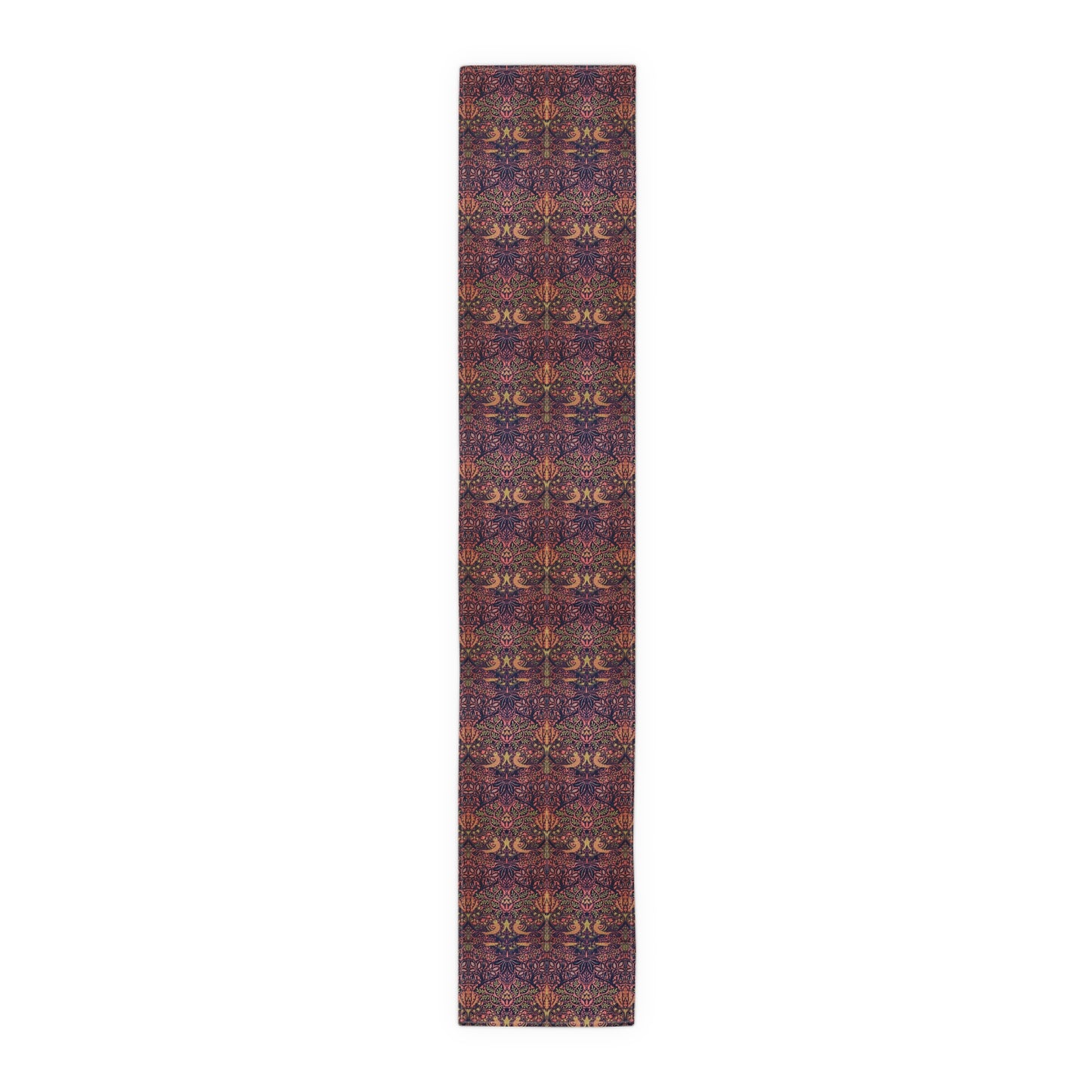 A multicolored table runner with a floral and William Morris & Co animal pattern displayed on a dining table.