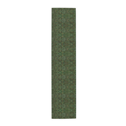 A green table runner with a floral William Morris & Co pattern displayed on a dining table.