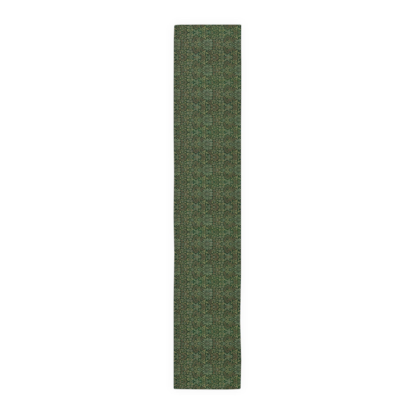 A green table runner with a floral William Morris & Co pattern displayed on a dining table.