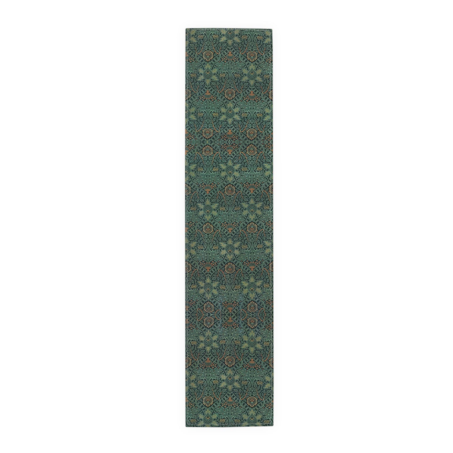 A green table runner with a floral pattern inspired by William Morris, displayed on a dining table with dishes and cutlery.