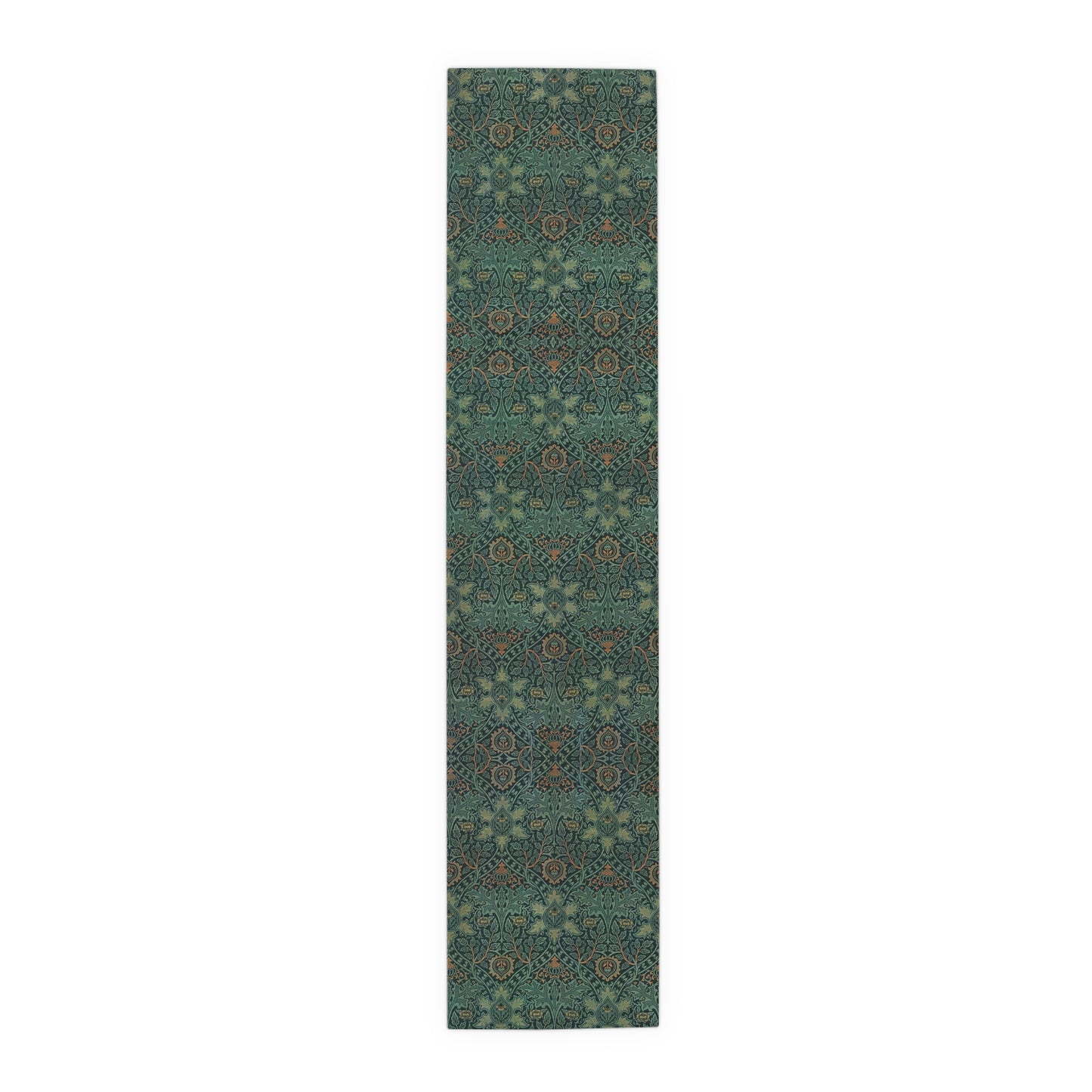 A green table runner with a floral pattern inspired by William Morris, displayed on a dining table with dishes and cutlery.