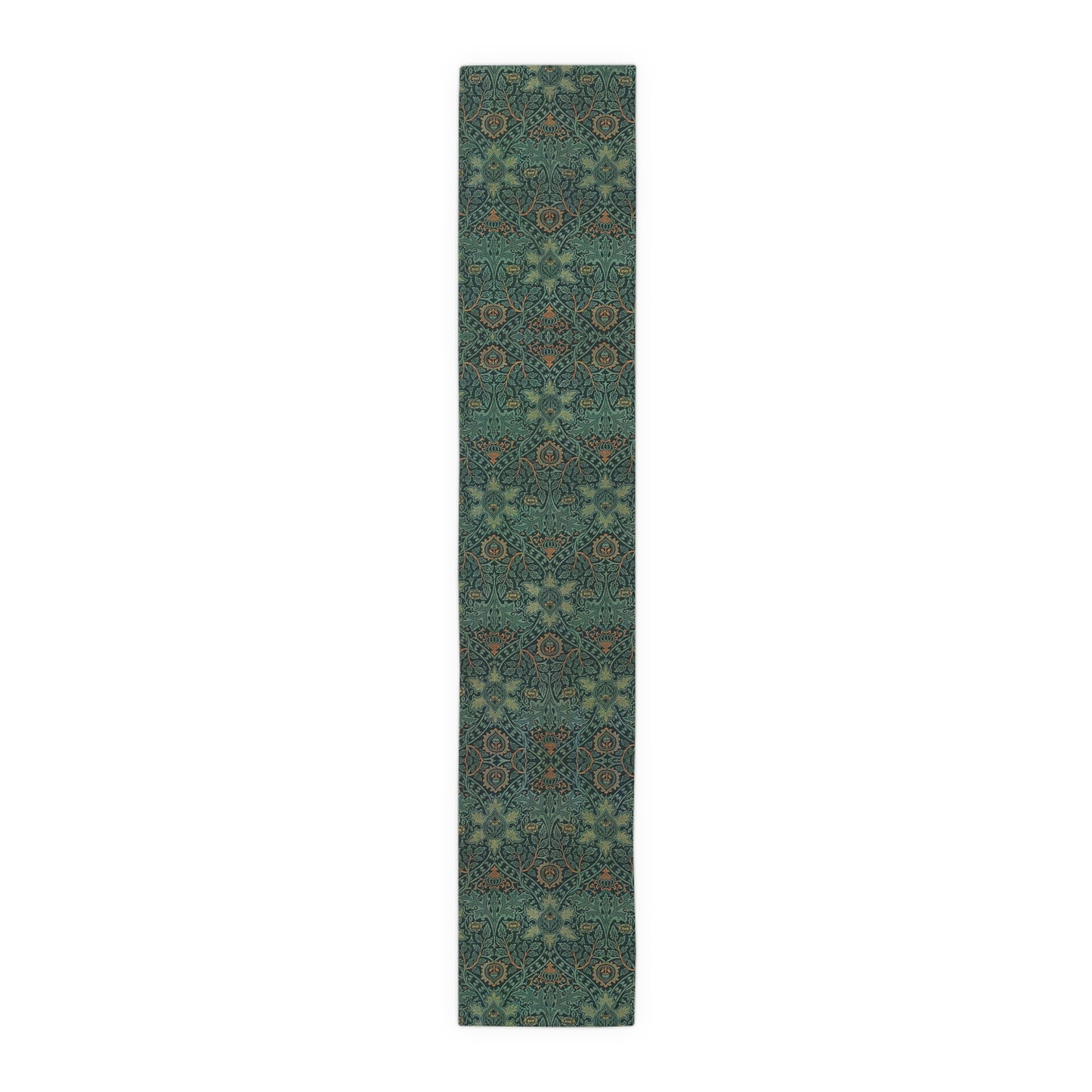 A green table runner with a floral pattern inspired by William Morris, displayed on a dining table with dishes and cutlery.