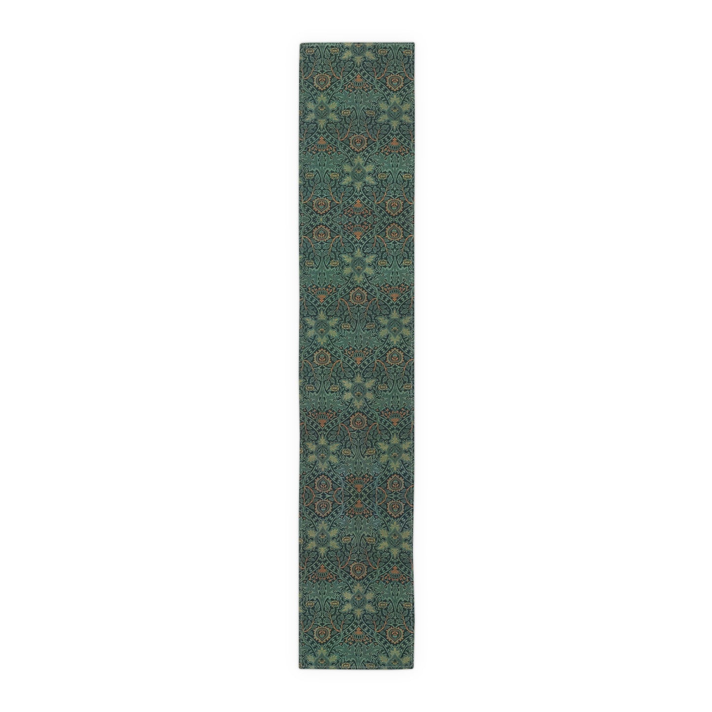 A green table runner with a floral pattern inspired by William Morris, displayed on a dining table with dishes and cutlery.