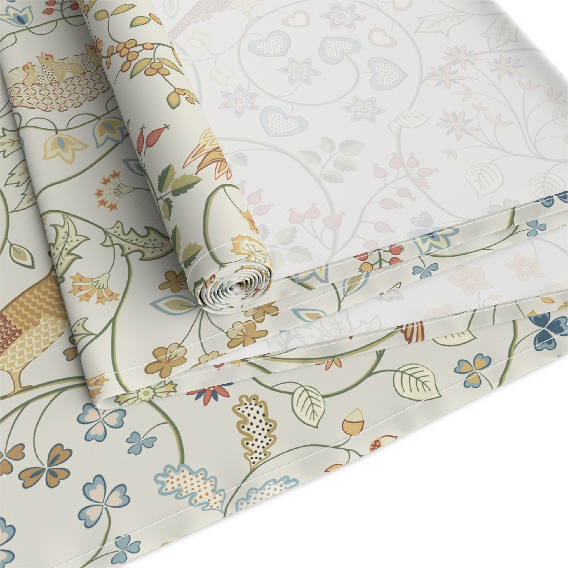 Roll of floral-patterned fabric with a white background