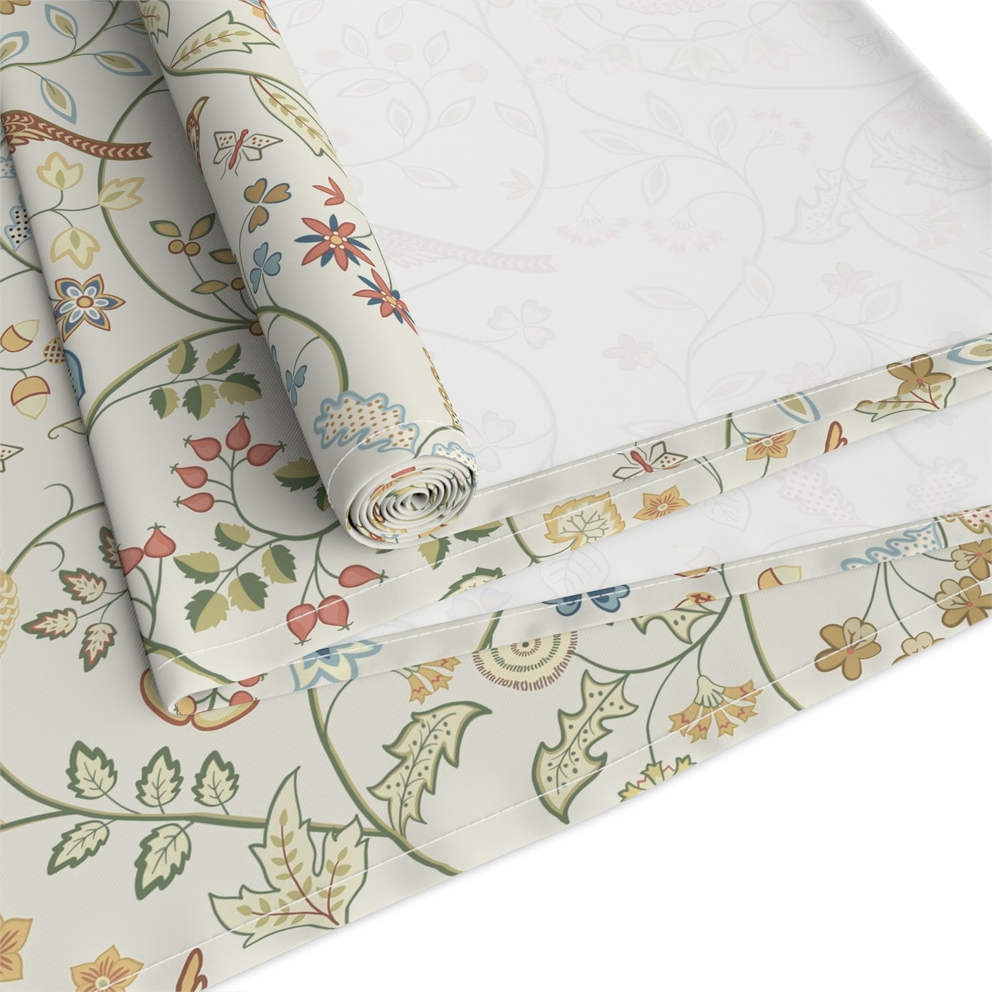Roll of floral-patterned fabric on a white background
