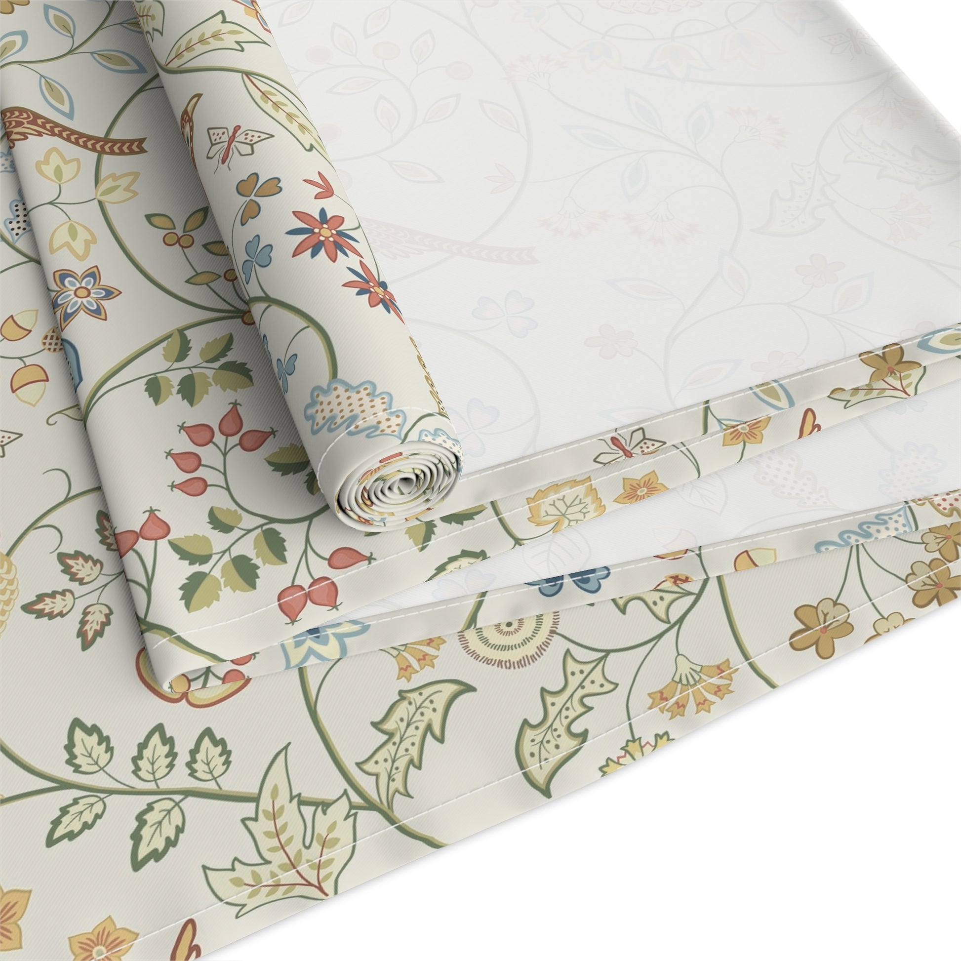 Roll of floral-patterned fabric on a white background