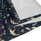 Rolls of fabric with bird and floral pattern on a white background