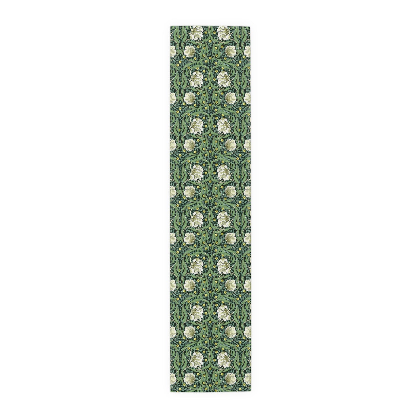 A green table runner with a floral William Morris & Co pattern displayed on a dining table.