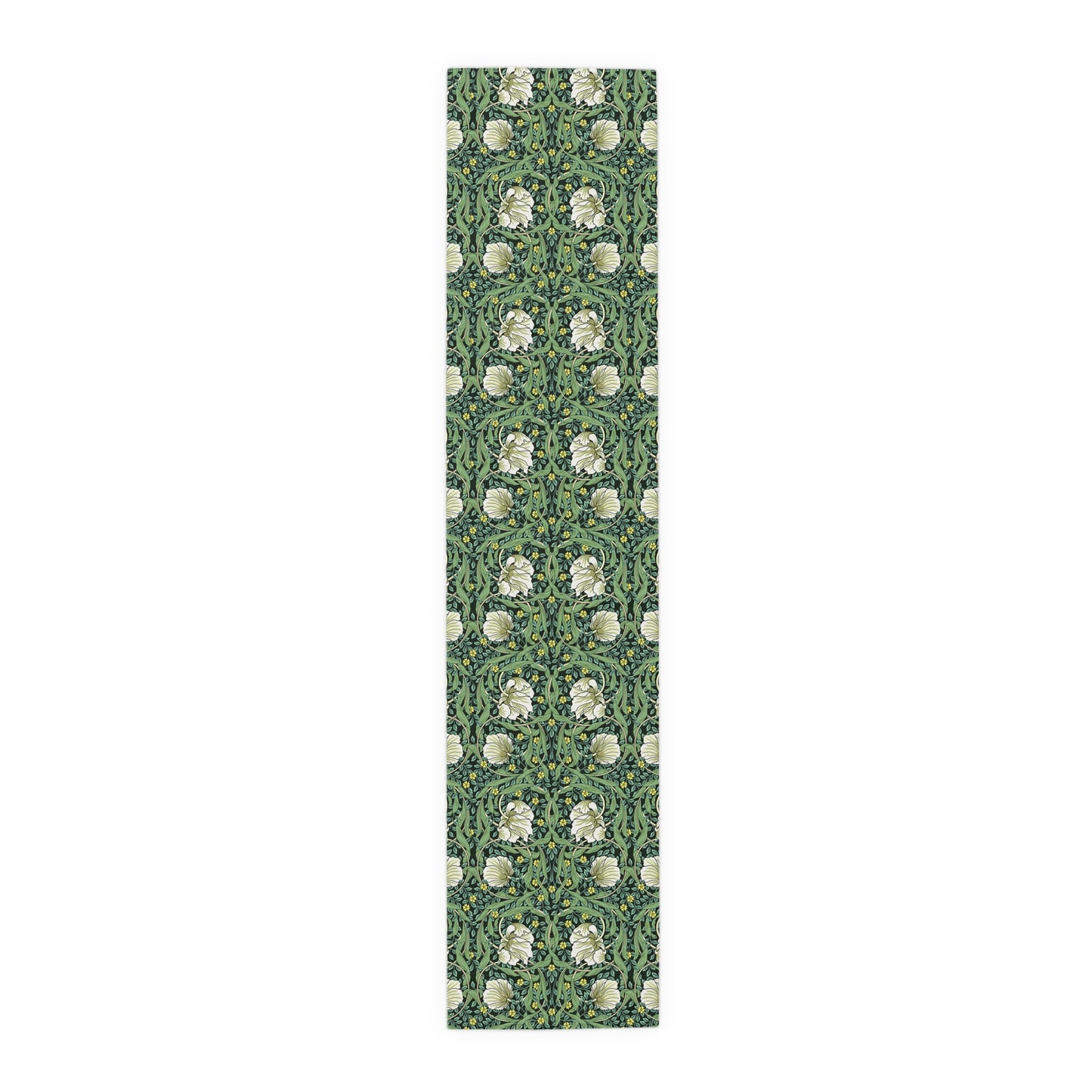 A green table runner with a floral William Morris & Co pattern displayed on a dining table.