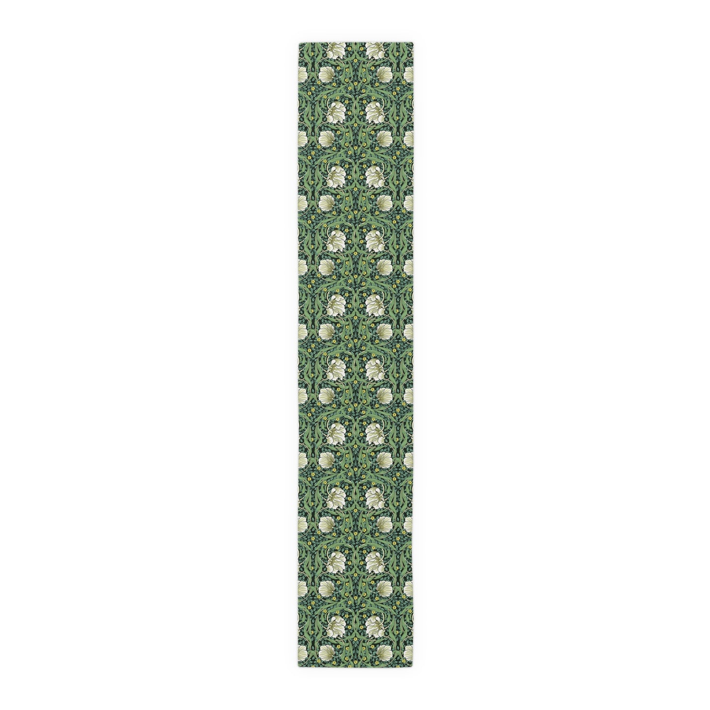 A green table runner with a floral William Morris & Co pattern displayed on a dining table.