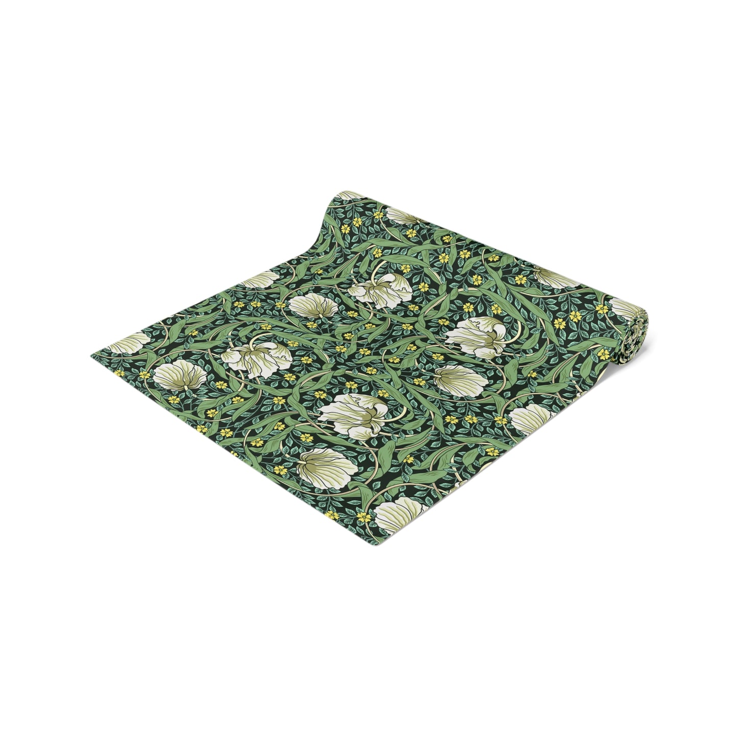 A green table runner with a floral William Morris & Co pattern displayed on a dining table.