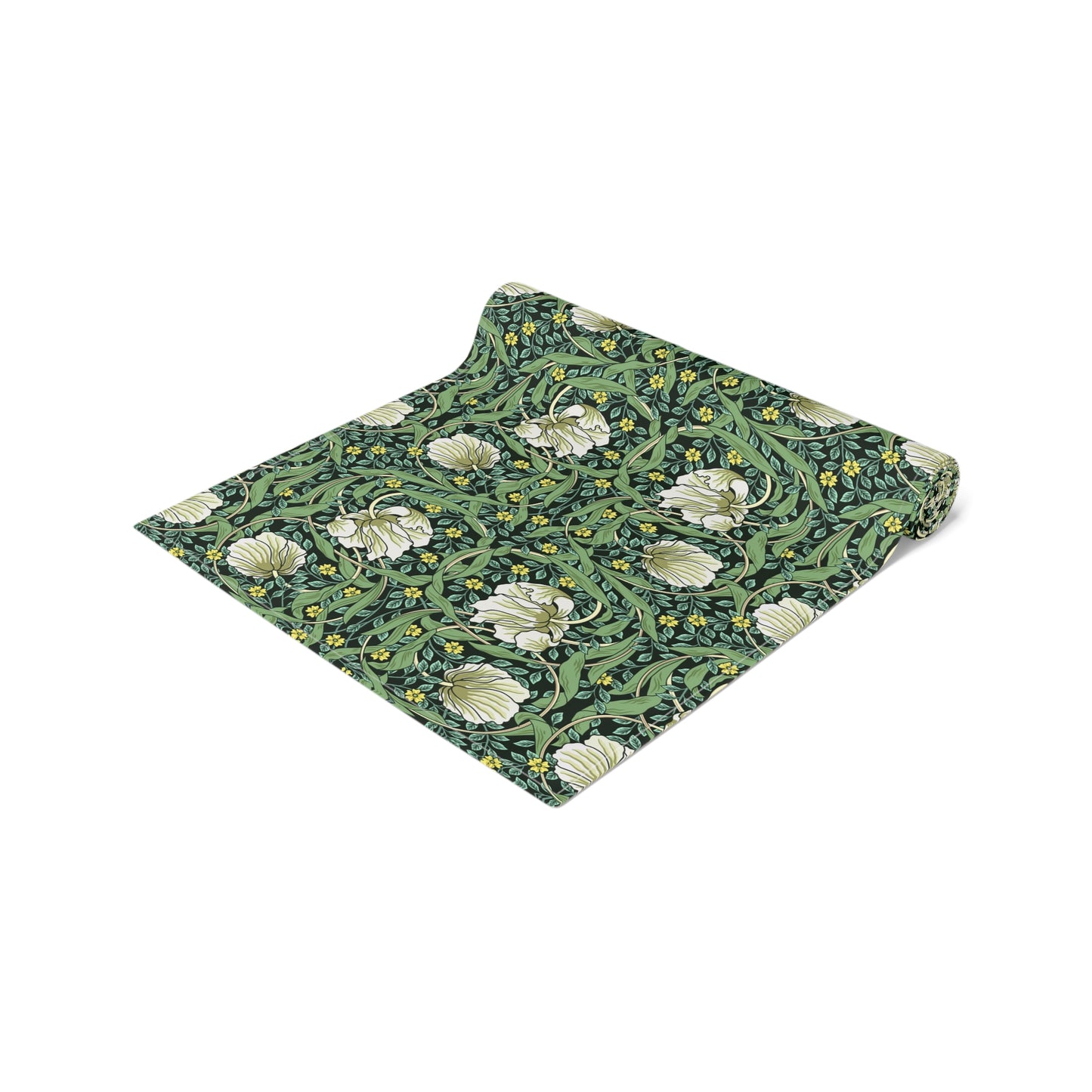 A green table runner with a floral William Morris & Co pattern displayed on a dining table.