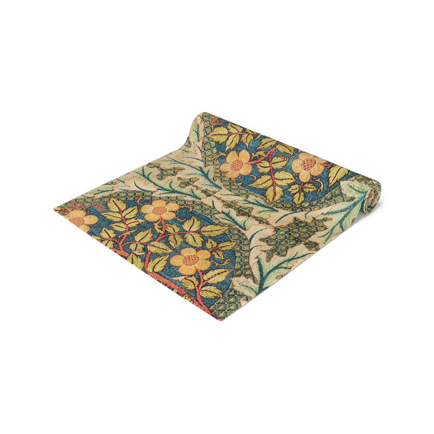 A table runner with a floral pattern inspired by William Morris, displayed on a dining table set with dishes and glasses.