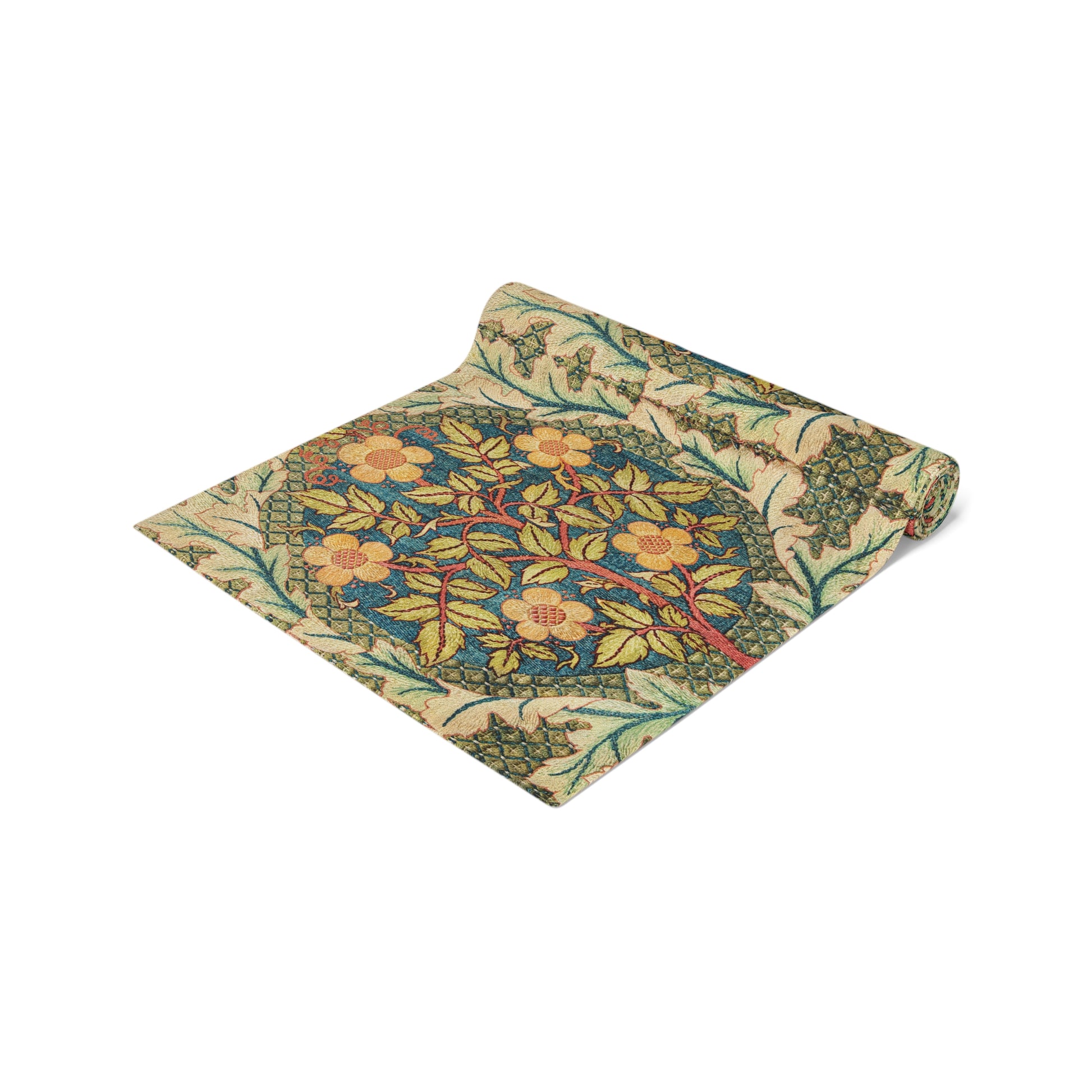 A table runner with a floral pattern inspired by William Morris, displayed on a dining table set with dishes and glasses.