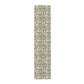 Long narrow rug with a geometric pattern on a white background