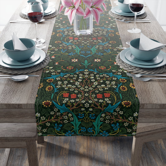 A floral patterned table runner inspired by William Morris, displayed on a dining table.