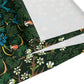 A floral patterned table runner inspired by William Morris, displayed on a dining table.