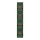A floral patterned table runner inspired by William Morris, displayed on a dining table.