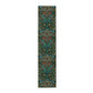 A floral patterned table runner inspired by William Morris, displayed on a dining table.