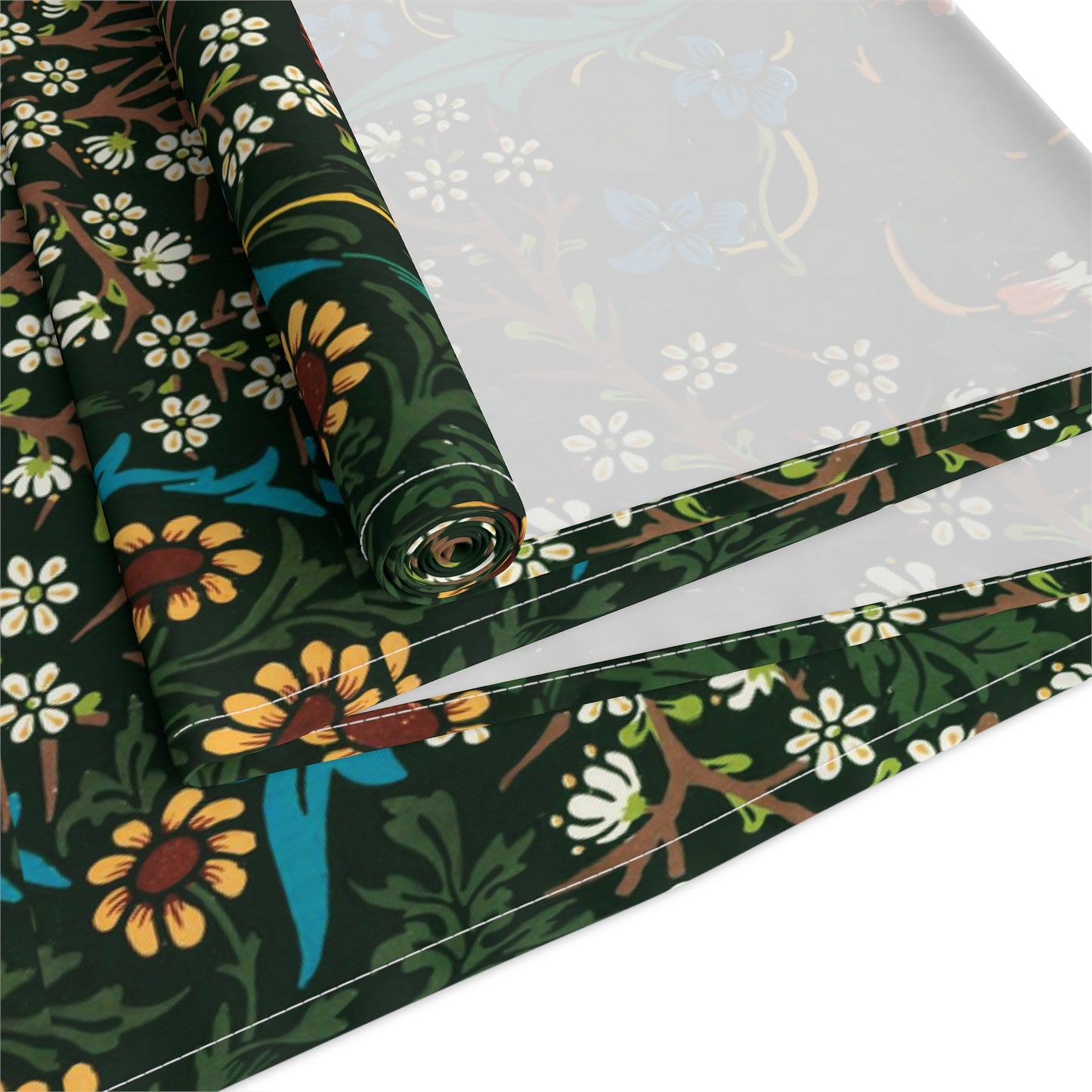 A floral patterned table runner inspired by William Morris, displayed on a dining table.