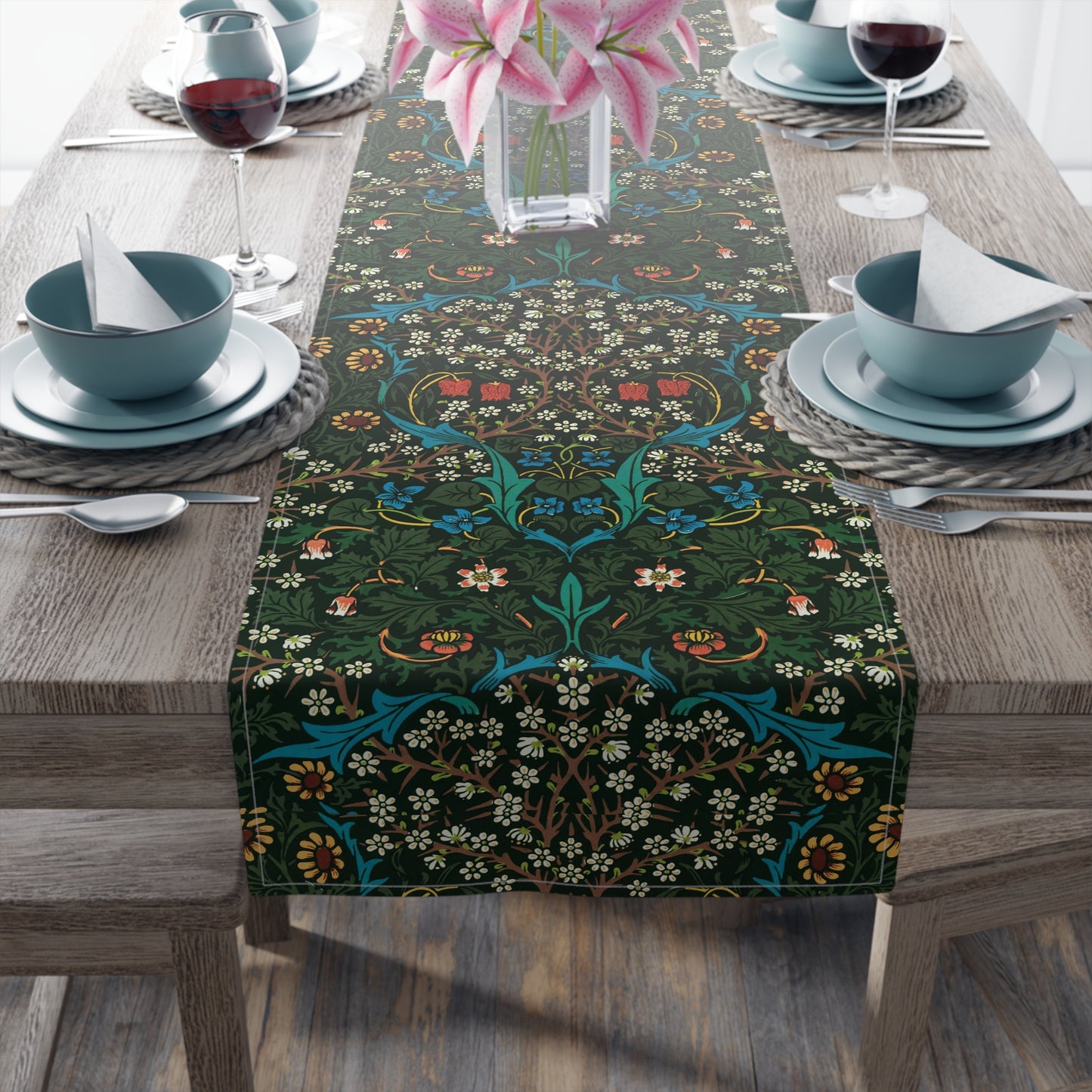 A floral patterned table runner inspired by William Morris, displayed on a dining table.