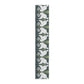Long rectangular mat with swan and leaf pattern on a white background
