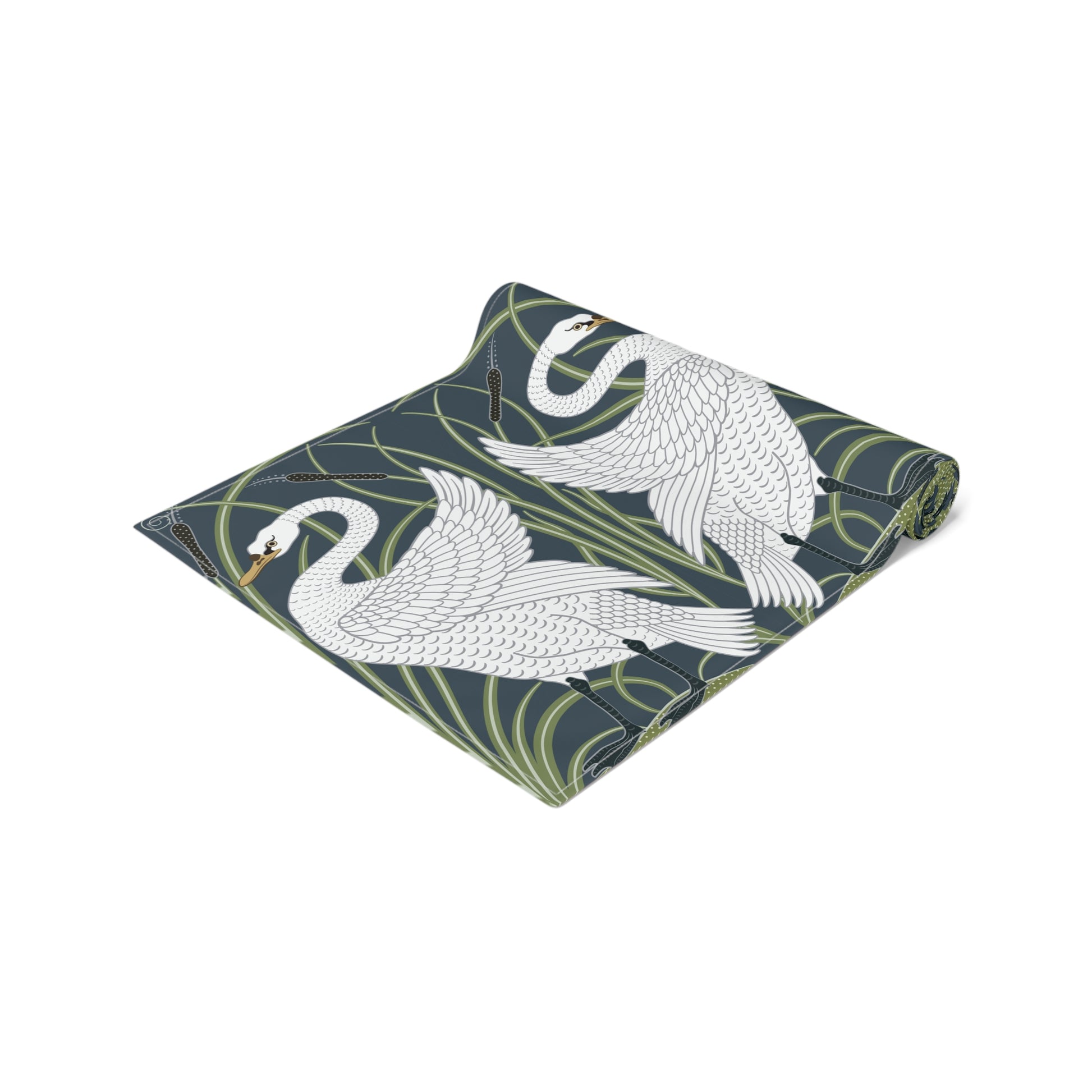 Folded fabric with swan design on a white background