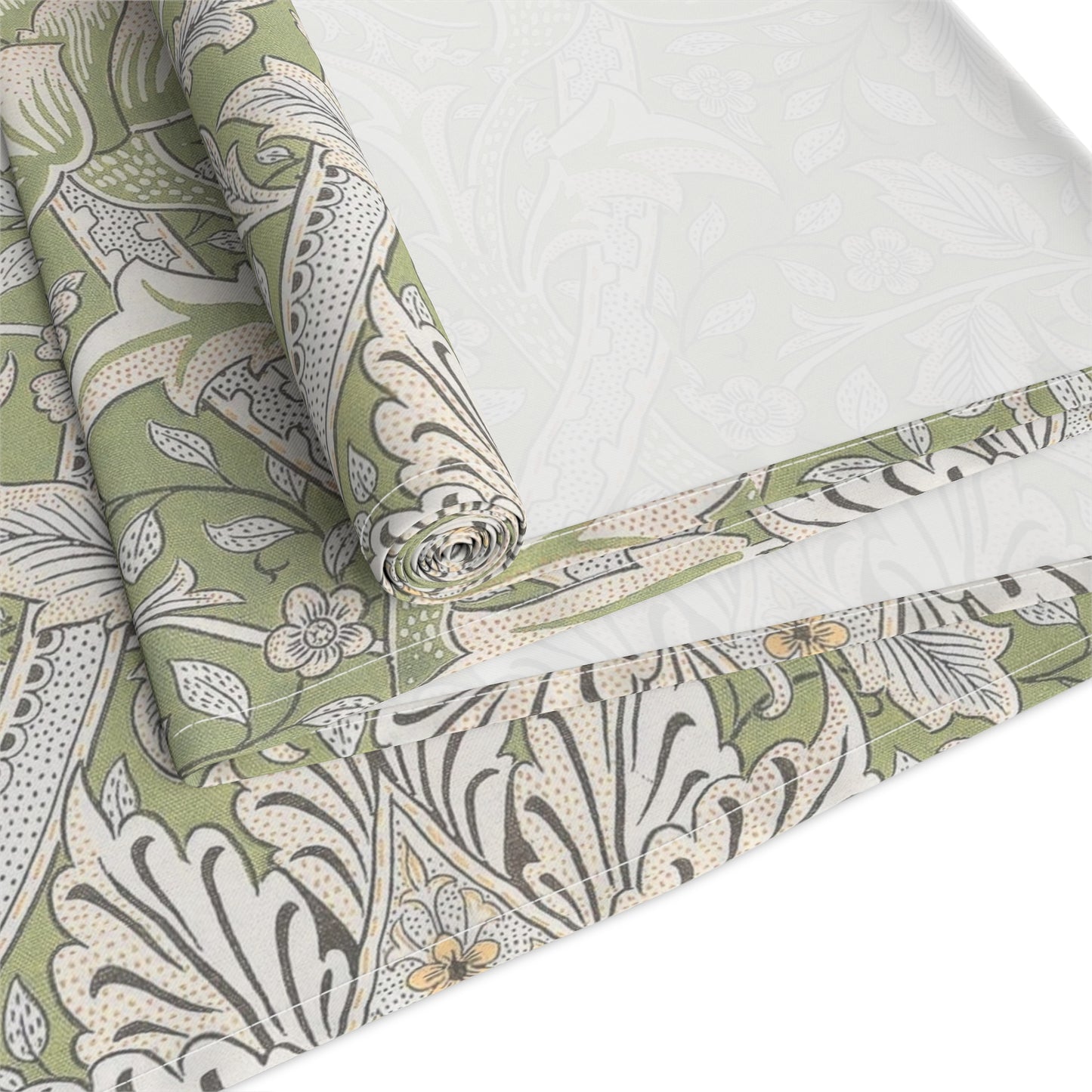 Floral patterned fabric with green, beige, and white colors on a white background