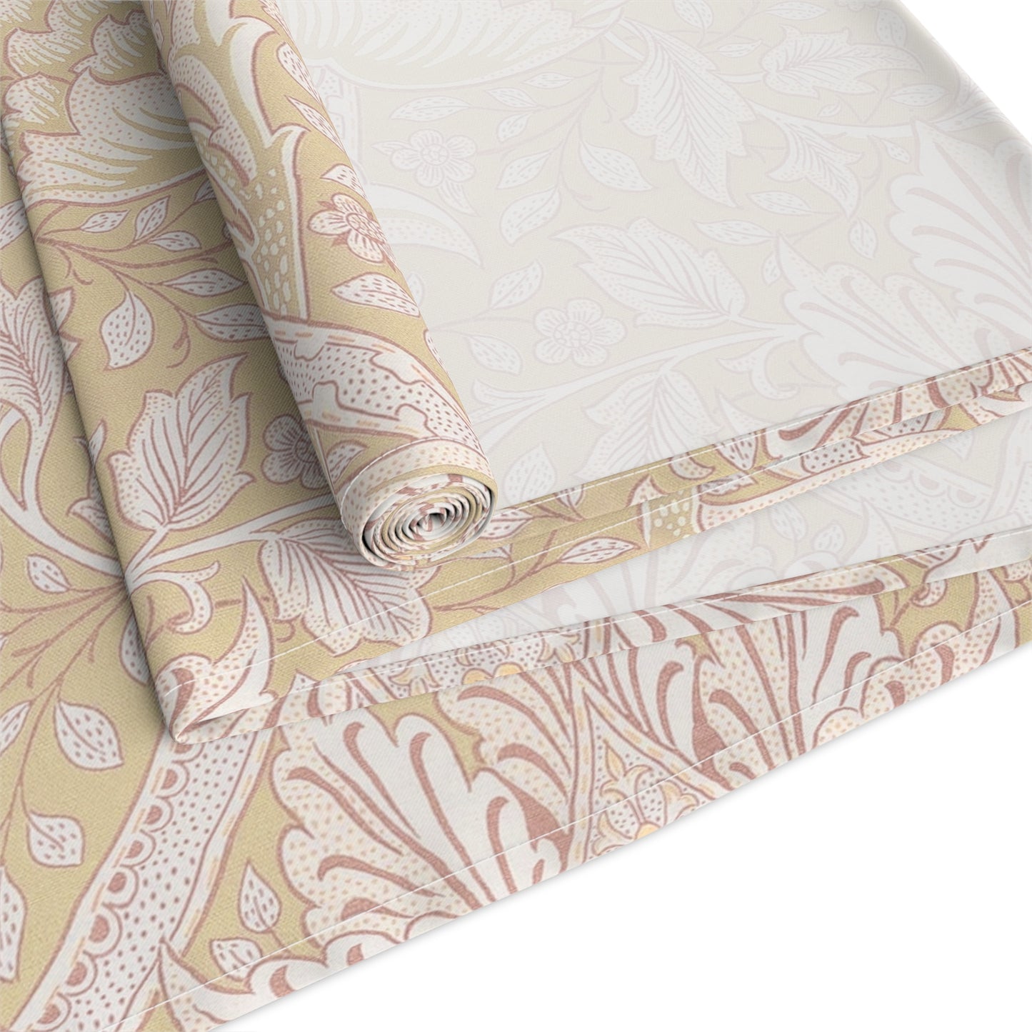 Rolls of floral-patterned fabric in beige and white on a white background