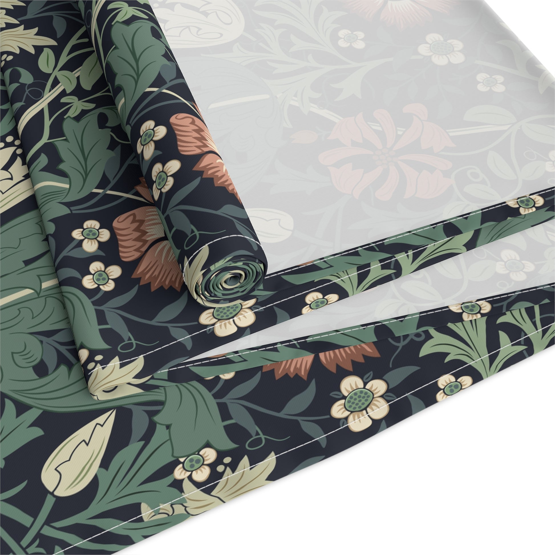 Roll of floral-patterned fabric with a white background