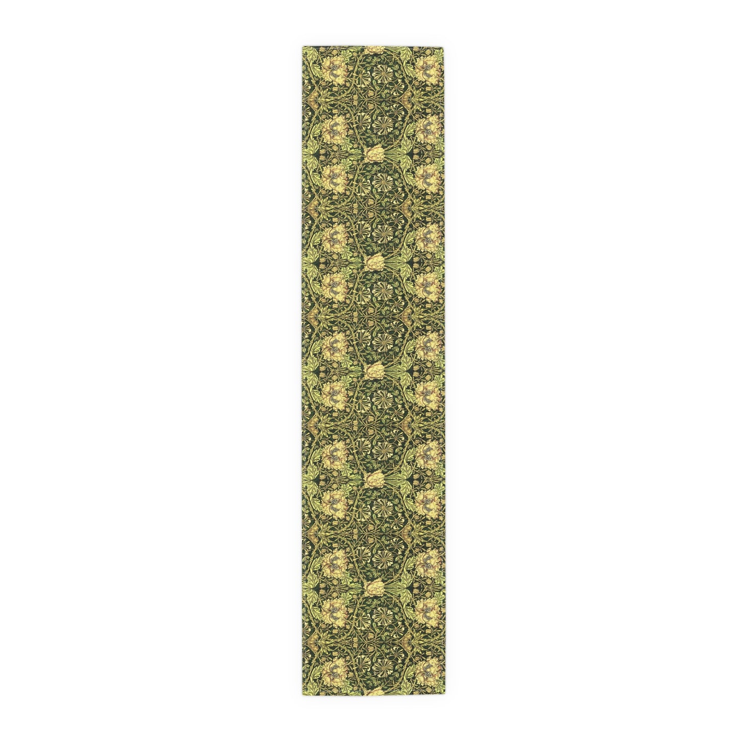 A floral patterned table runner in gold and green shades, laid out on a dining table with place settings and decorative flowers.