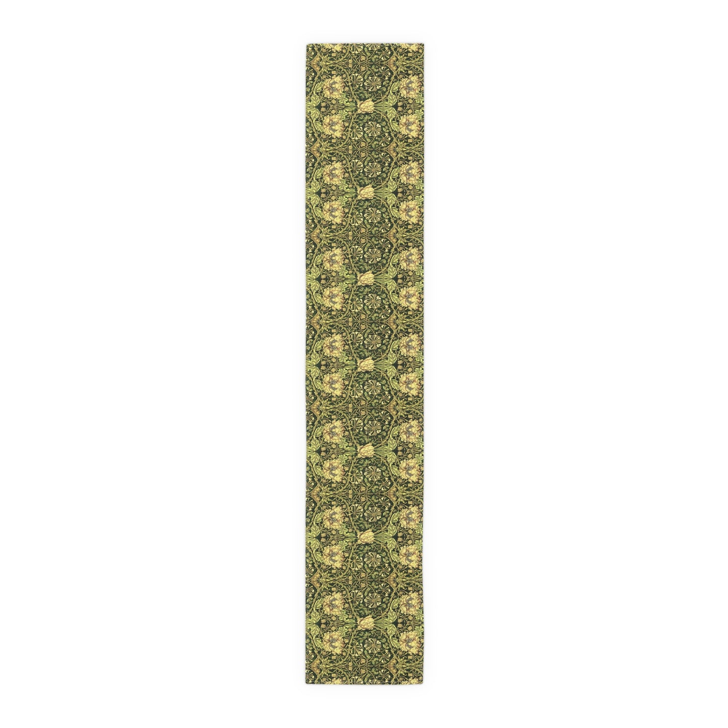 A floral patterned table runner in gold and green shades, laid out on a dining table with place settings and decorative flowers.
