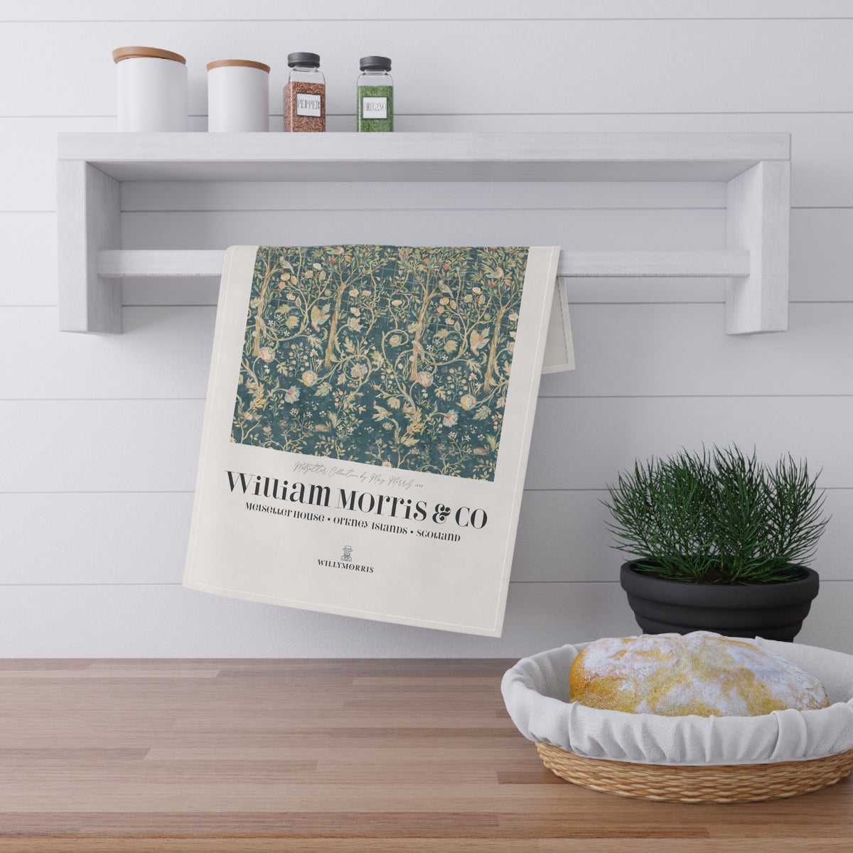 Kitchen Tea Towel designed by May Morris for William Morris & Co in a green floral pattern called Melsetter Collection (Evergreen Teal) an Art Print on a tea Towel