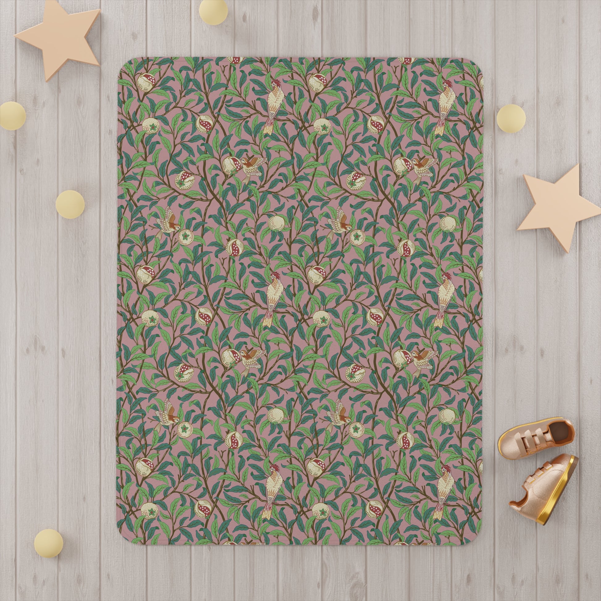 Patterned rug on a wooden floor with decorative stars and shoes around