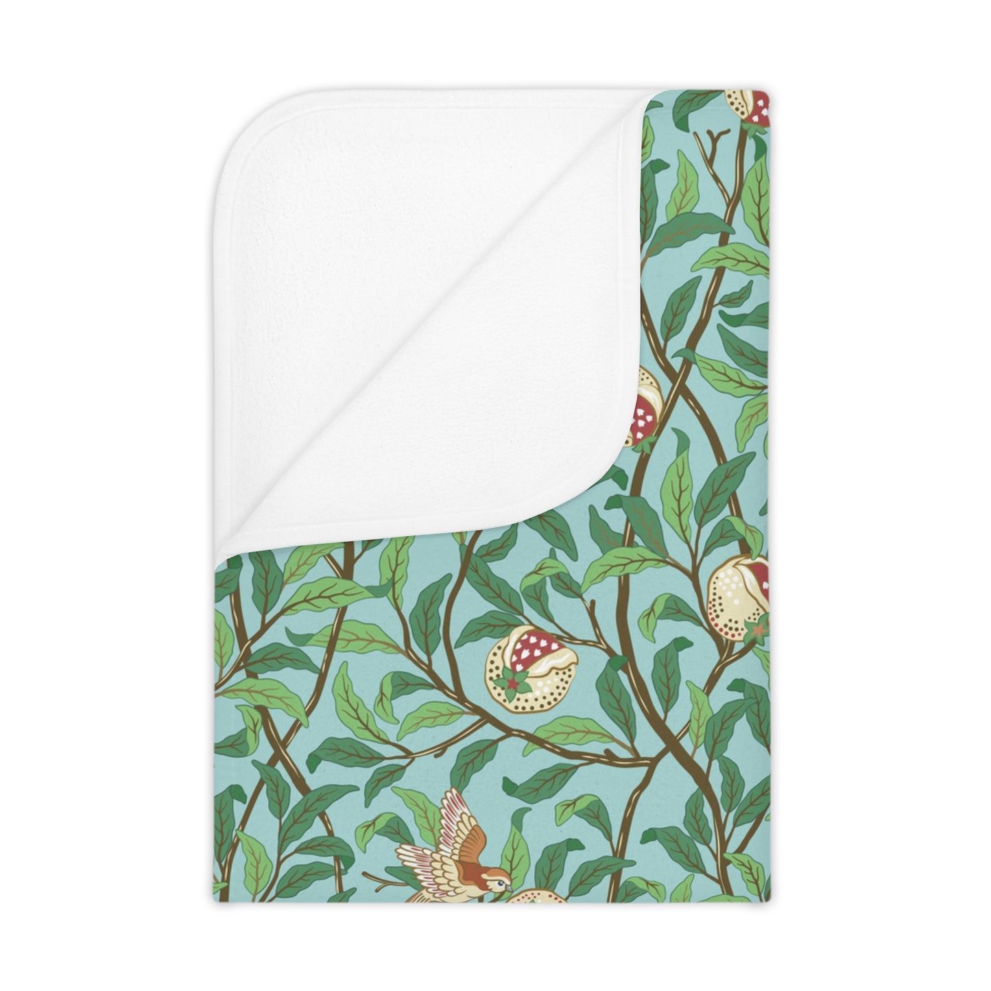 A toddler blanket with a floral pattern featuring birds and pomegranate designs on a tiffany blue background.