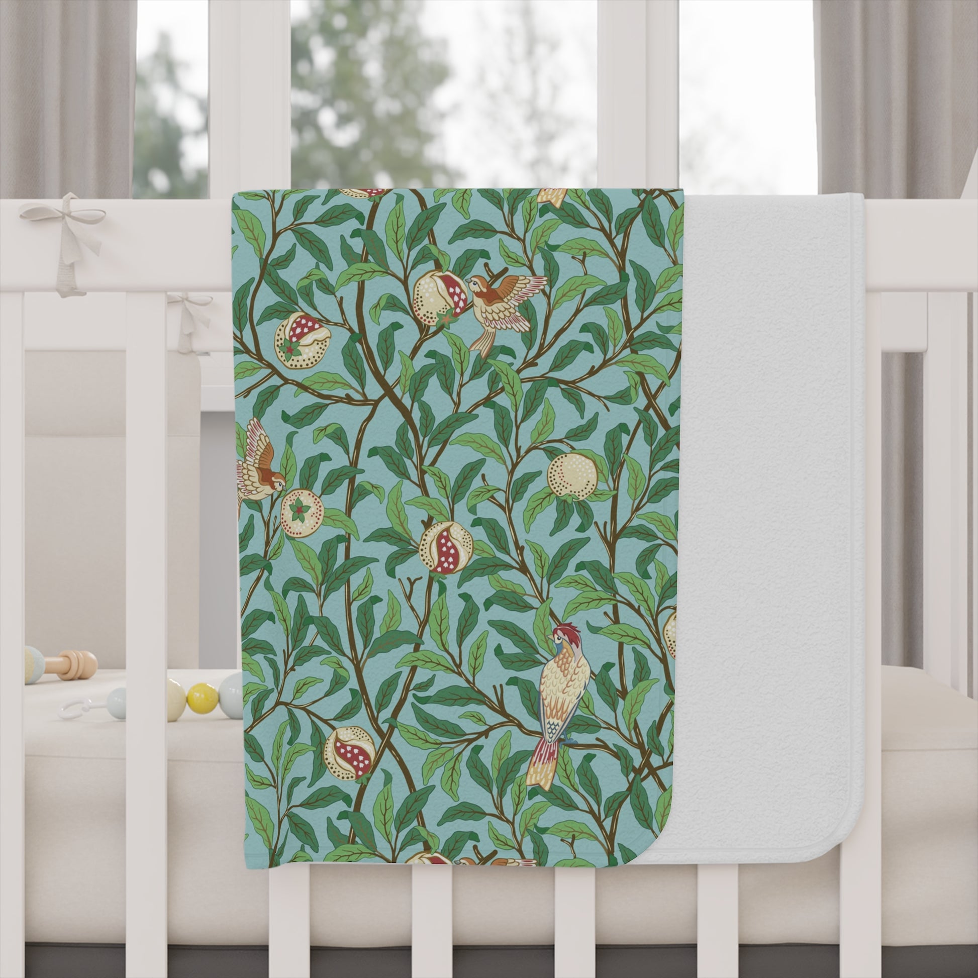 Table runner with bird and leaf pattern on a white table