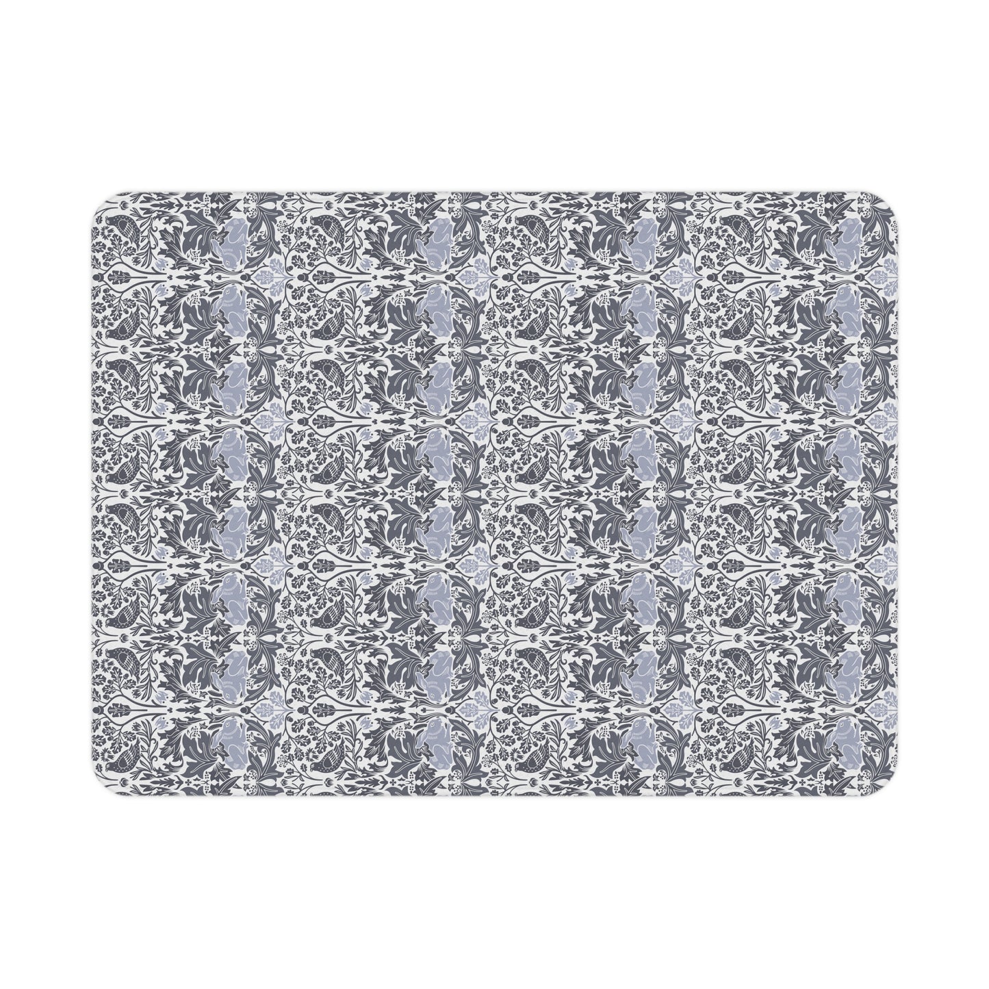 Patterned doormat with a blue and gray design on a white background