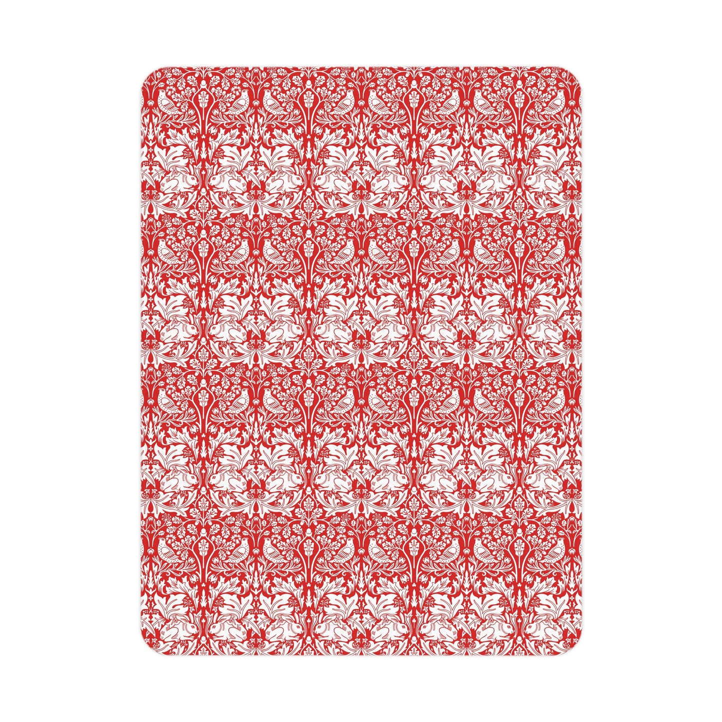 Red and white floral patterned rug on a white background