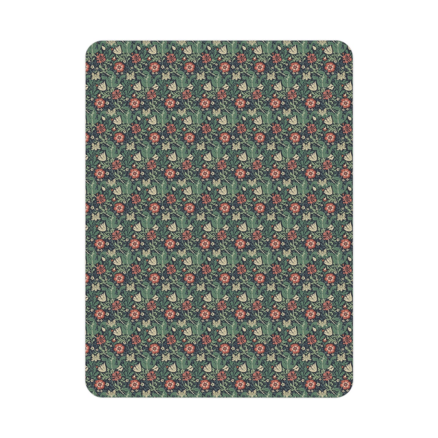 Floral patterned rug with red flowers on a green background