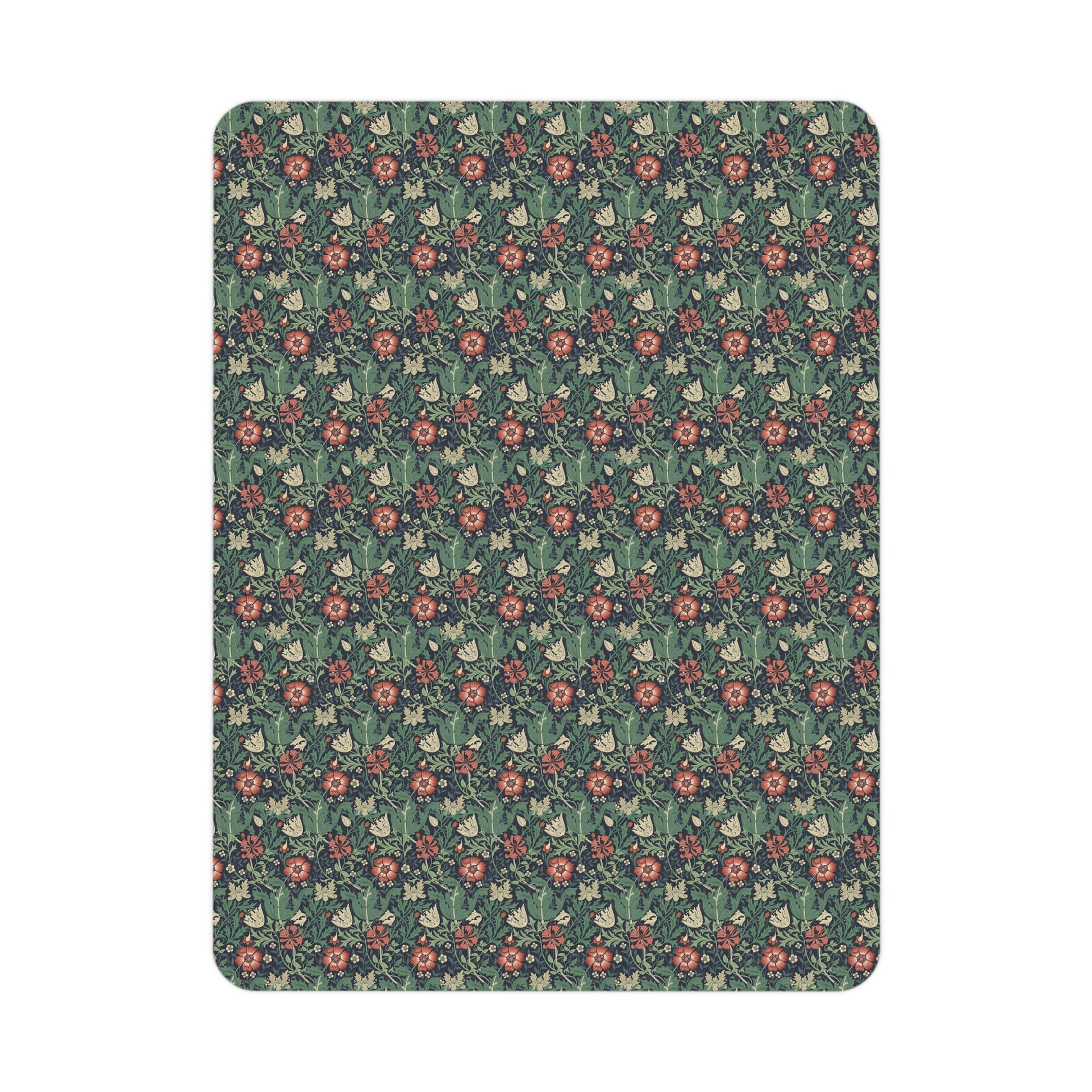 Floral patterned rug with red flowers on a green background